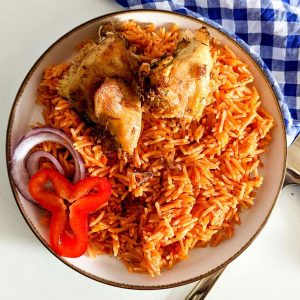 JOLLOF RICE w/ Protein and One Side